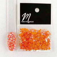 Marie eve mongeau diamants gros plan orange givre